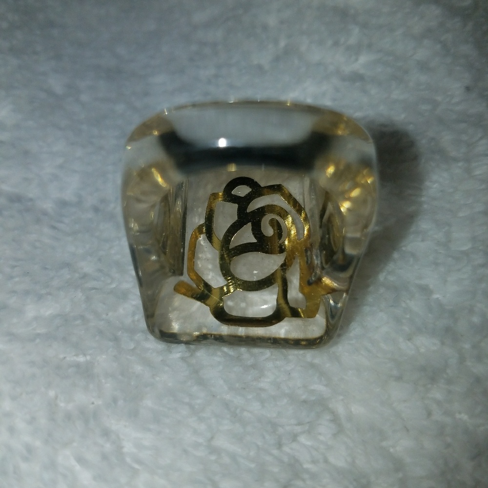 Clear crystal resin ring with golden rose inside